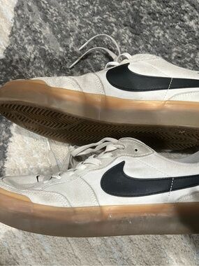 Nike Men’s White Canvas Sneakers with Black Swoosh and Gum Sole
